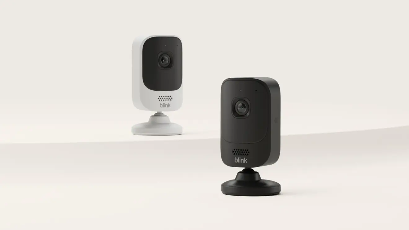 Two Blink Mini 4K+ indoor cameras, one white and one black