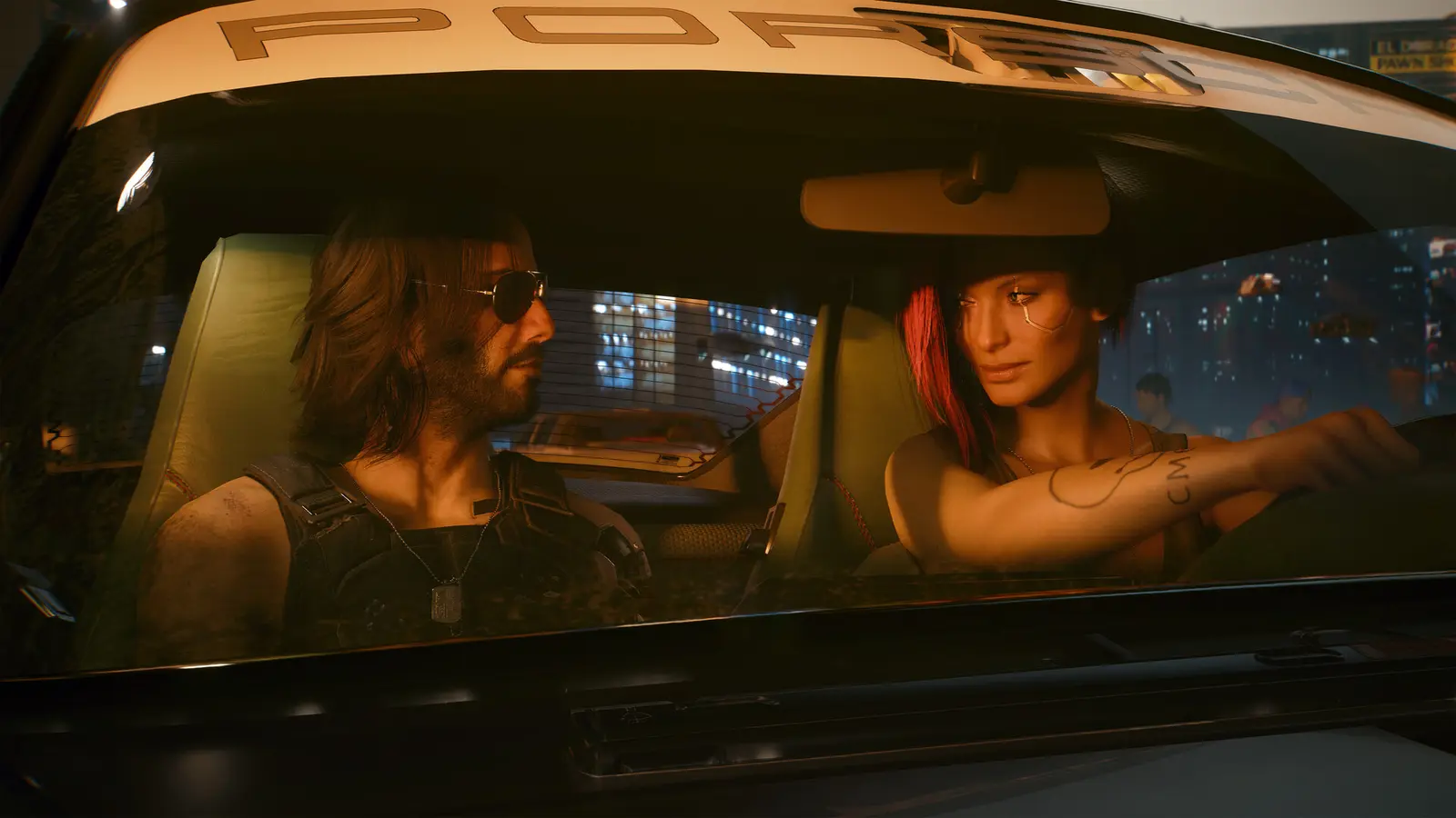 V and Johnny Silverhand riding in a car at night in Cyberpunk 2077