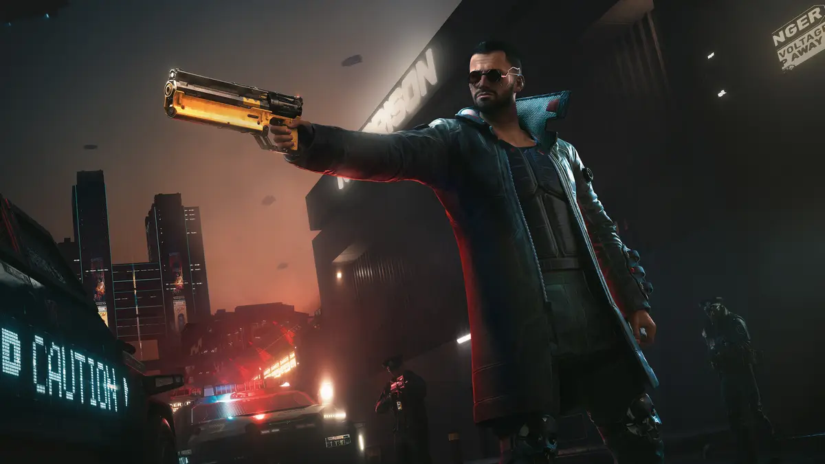 V aiming a pistol in front of a police car at night