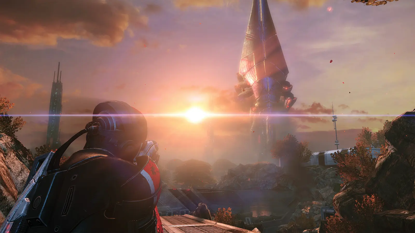 Commander Shepard looking toward a sunset in Mass Effect Legendary Edition