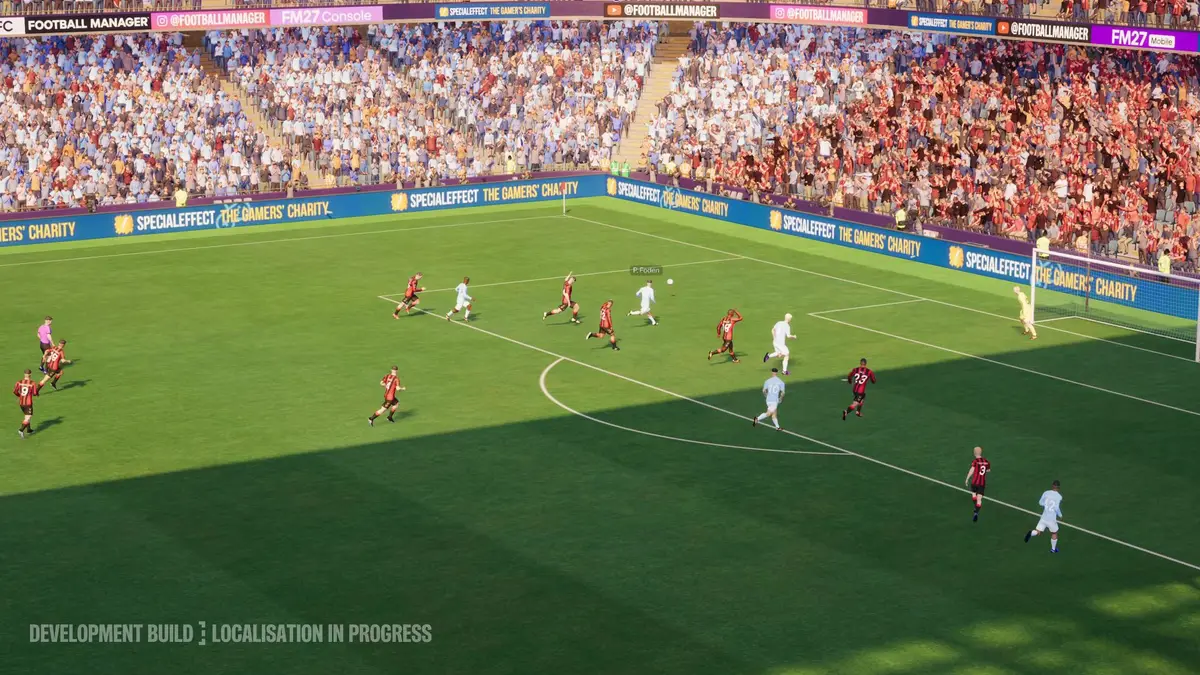 A Football Manager 27 match view showing players attacking in a full stadium