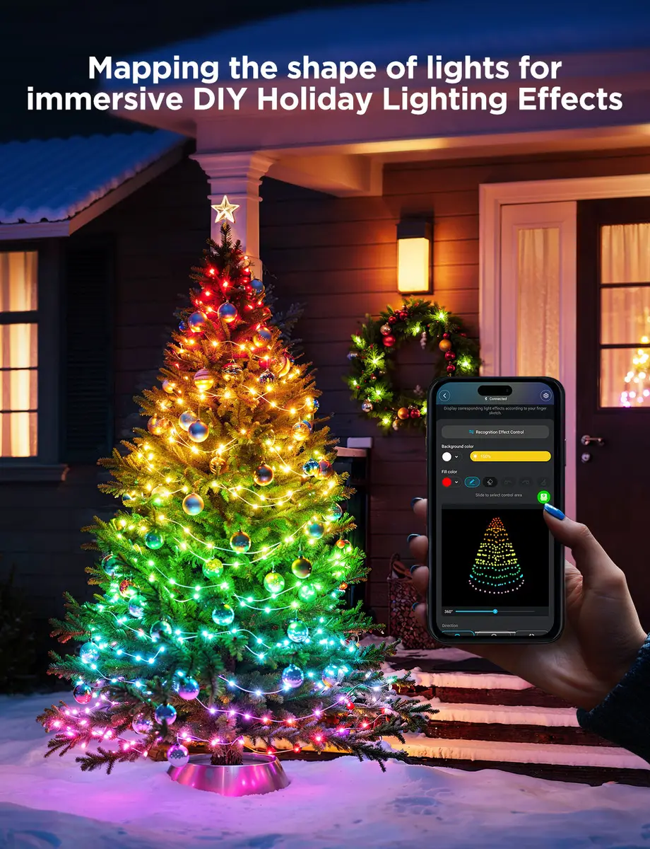 Hand holding a phone with the Govee app mapping the shape of lights on a decorated tree