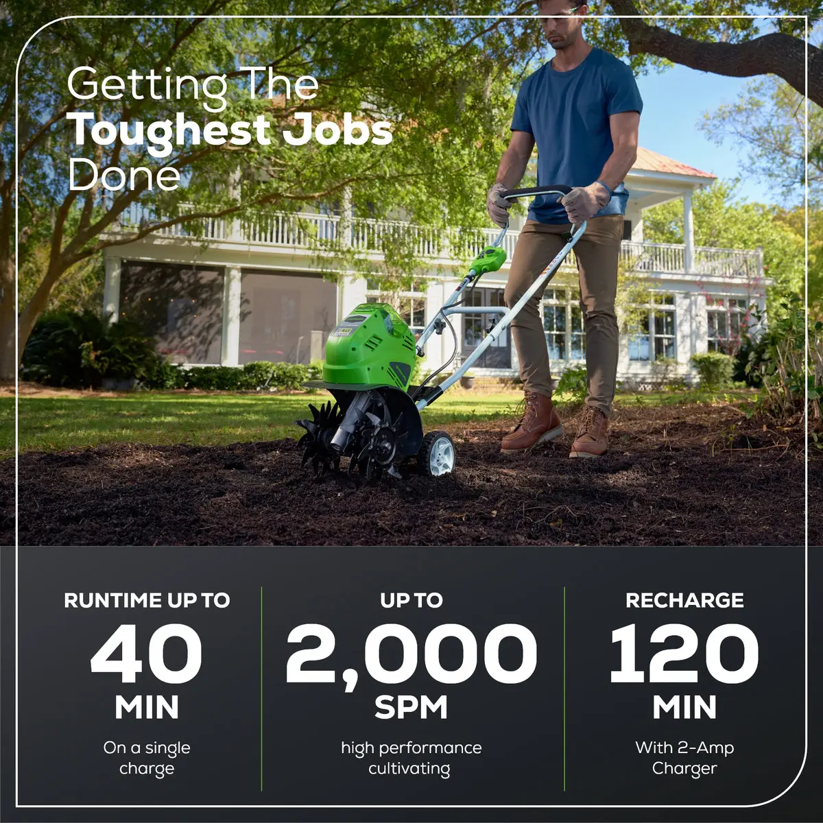 Người đàn ông dùng máy xới đất không dây Greenworks 40V màu xanh trong vườn