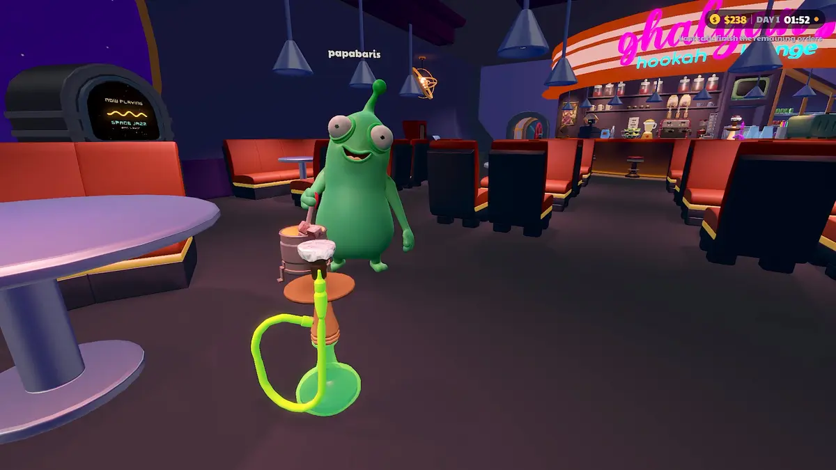An alien customer sitting at a table next to a green hookah inside the lounge