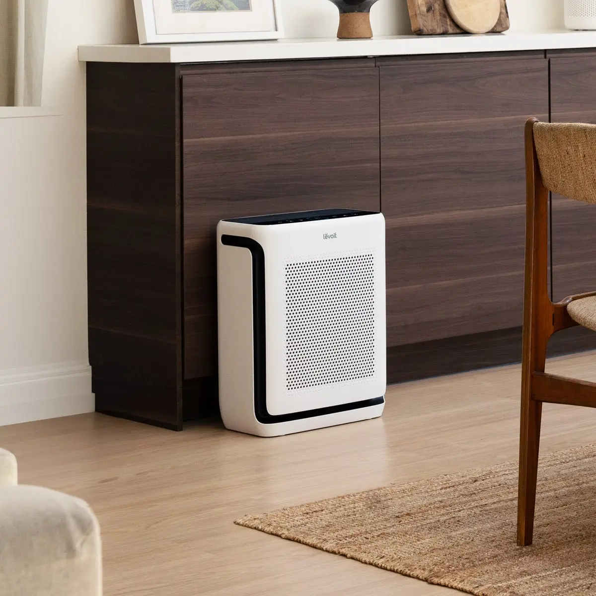 White Levoit Vital 200S air purifier standing in a living room