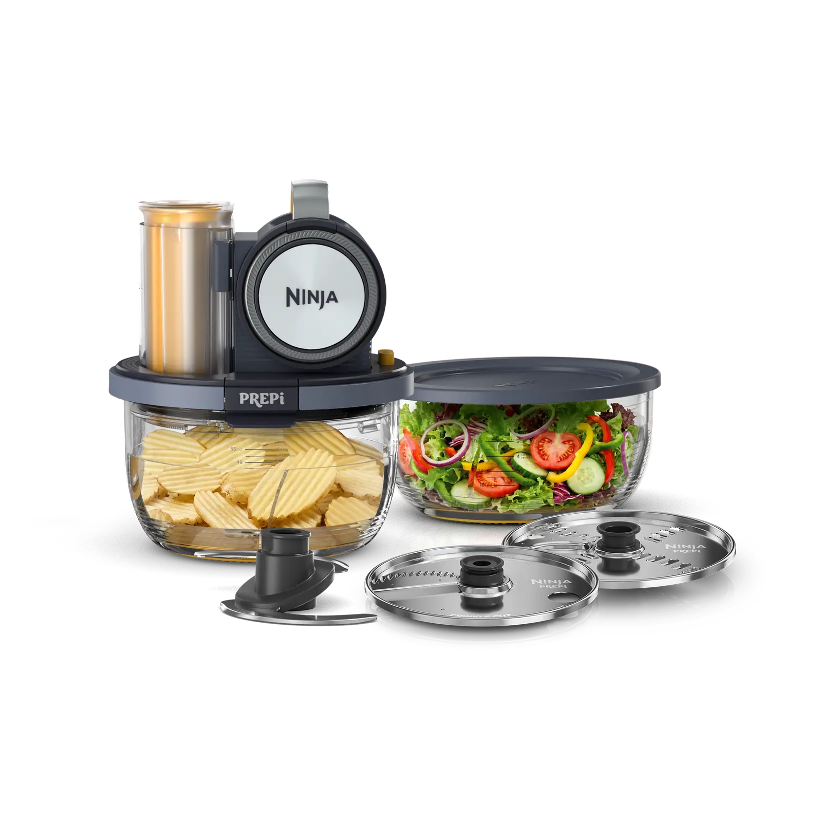 Ninja PREPi prep system with a bowl of crinkle cut potatoes, a salad bowl and two cutting discs
