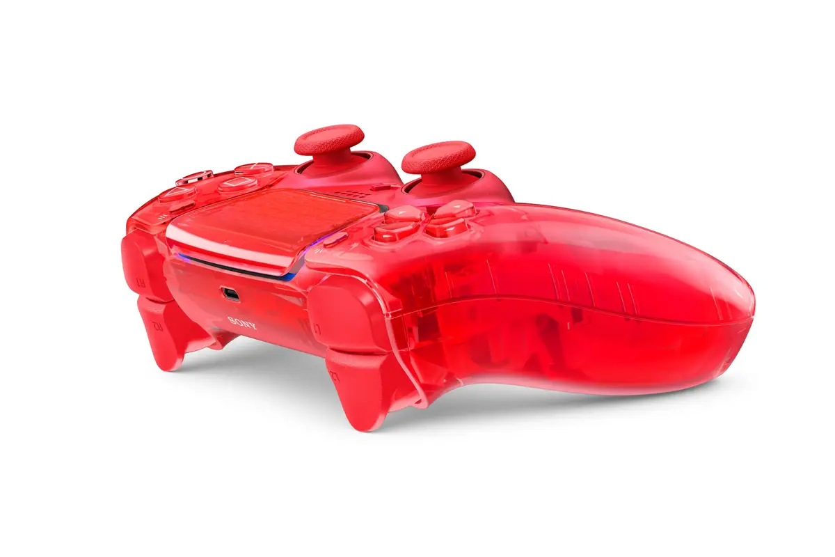 Flare Orange Prism DualSense controller seen at an angle