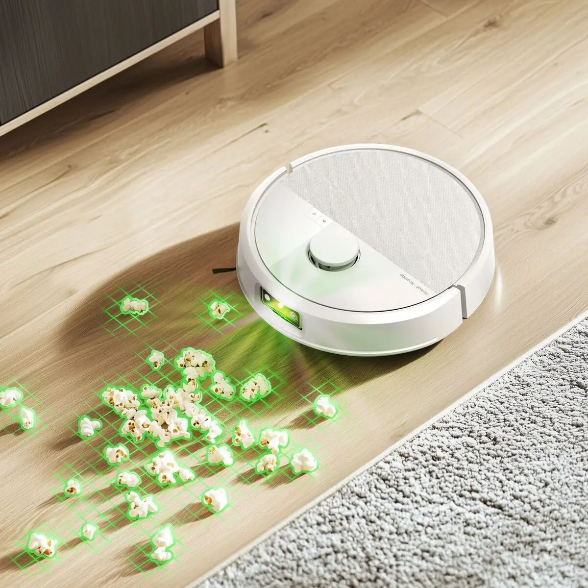 Robot Roomba sur un plancher qui détecte du maïs soufflé éparpillé