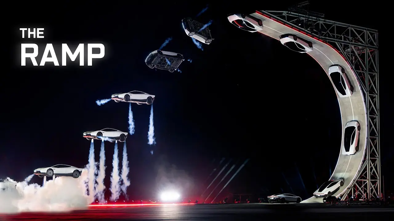 Tesla Roadster prototype launching off a curved ramp with thruster plumes at the October 15 event