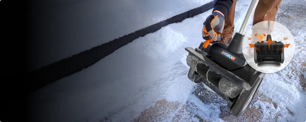 WORX WG460 snow shovel throwing snow with the 20V battery shown in a callout