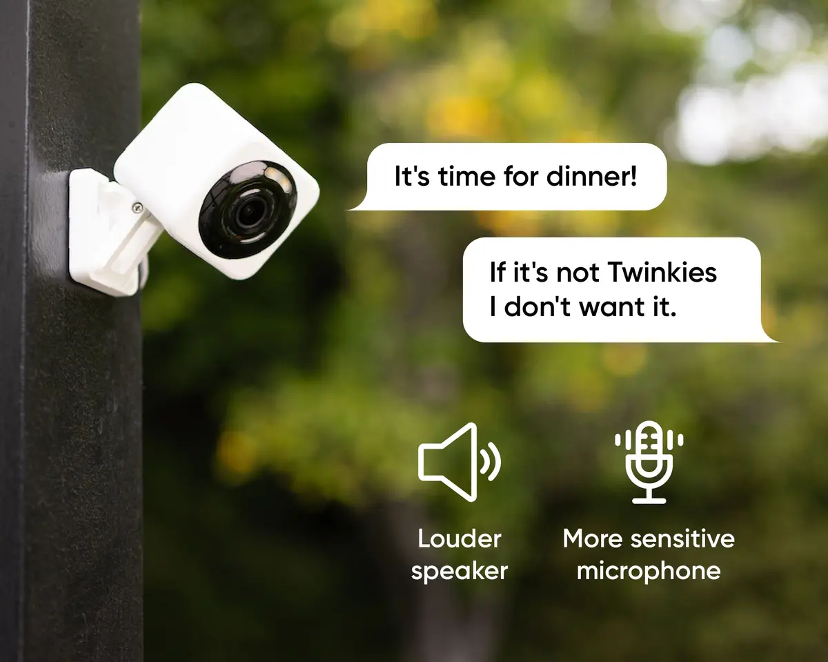 Wyze Cam v4 on a post outdoors with louder speaker and more sensitive microphone icons