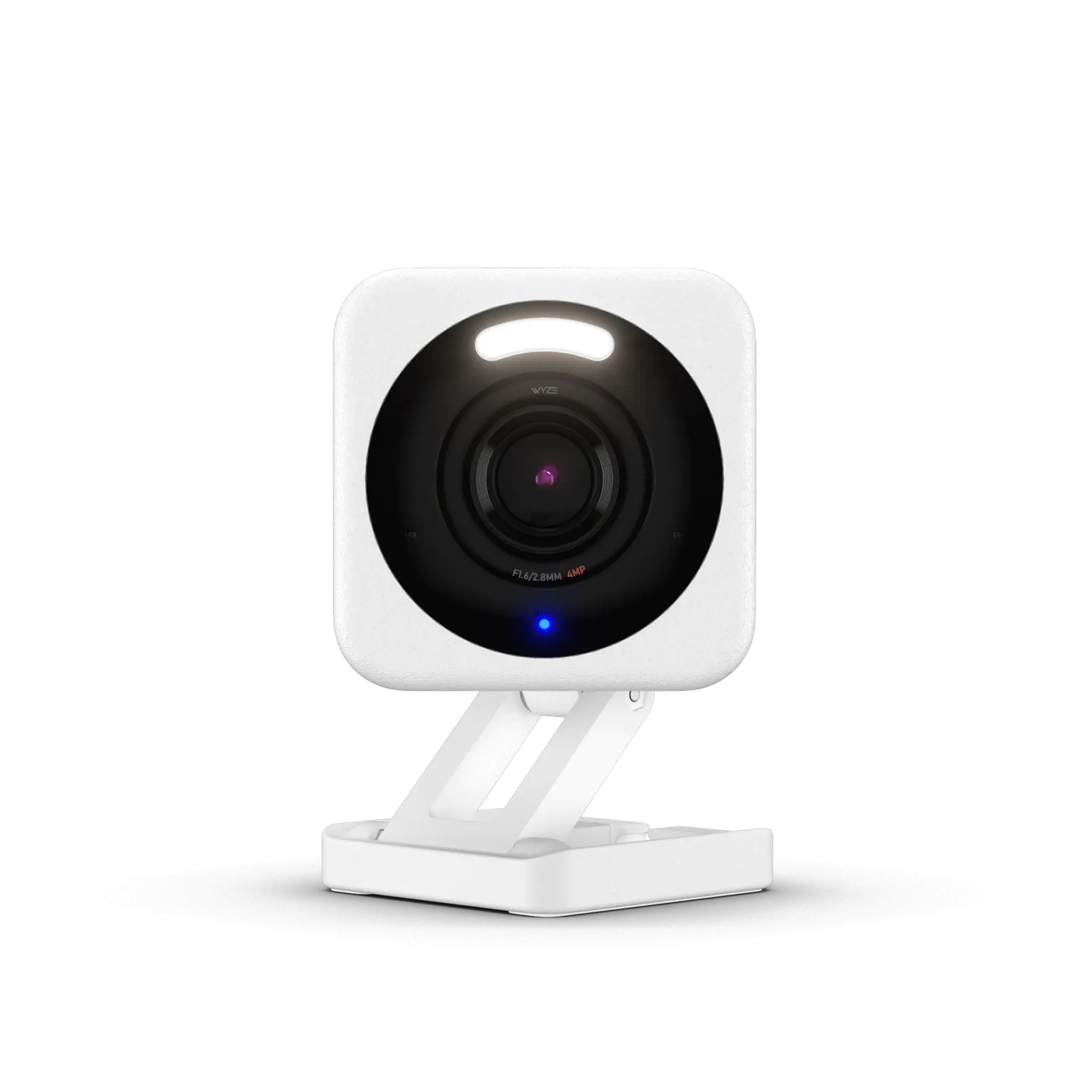 받침대 위에 놓인 흰색 Wyze Cam v4 보안 카메라, 렌즈 위에 스포트라이트가 있다