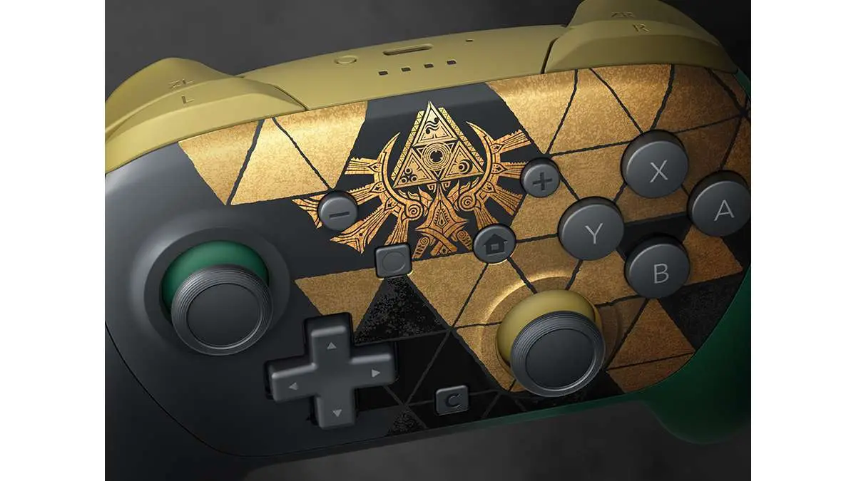 Close up of the gold Triforce pattern on the controller face